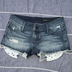 Black Orchid Stars & Paint Distressed jean shorts